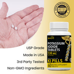 Close-up of divisible 130 mg potassium iodide tablets