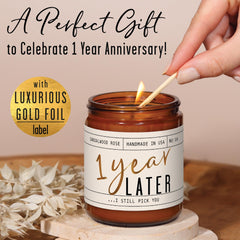 Close-up of gold foil message on anniversary candle