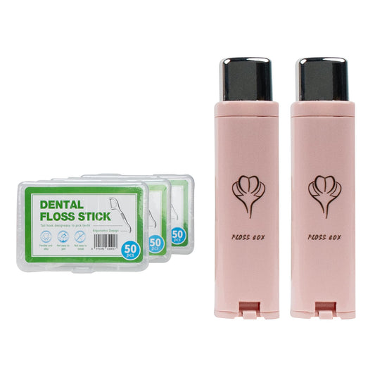 Two pink portable dental floss dispensers in a compact travel case