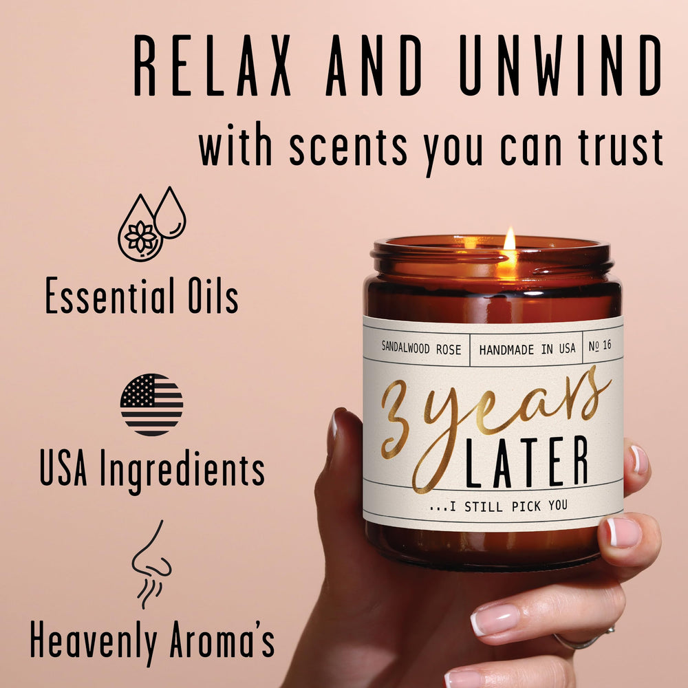 Decorative candle with gold foil inscription on label