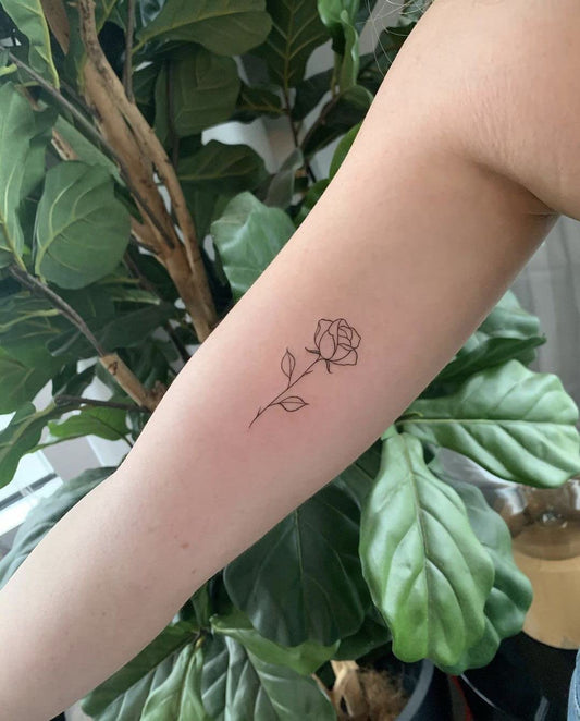 5X2Y Tattoo Tech two rose design on skin for a realistic, long-lasting look.