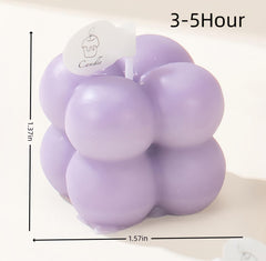Pastel cream bubble-shaped mini soy candle in frosted jar