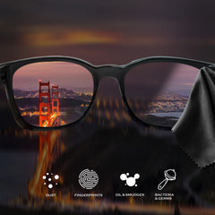 Close-up of microfiber cloth removing dust from glasses