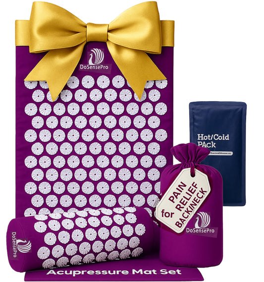 Purple acupressure mat with pillow set on white background