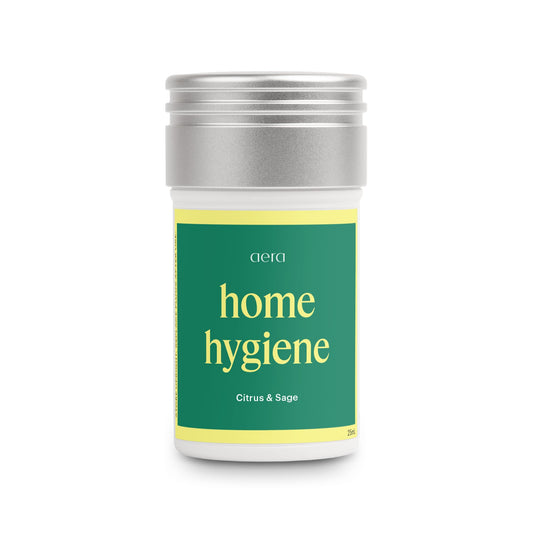 Aera Citrus and Sage refill bottle showing lemon and geranium notes for a bright room.