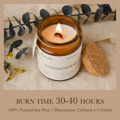 Lit sandalwood amber jar candle with wooden wick