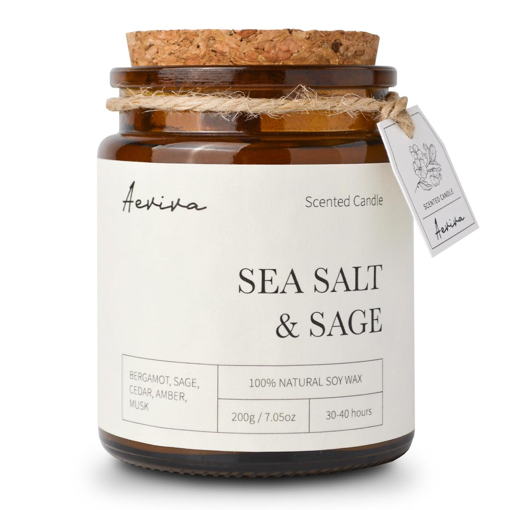 Aeviva Sea Salt & Sage scented candle in amber jar with wooden wick
