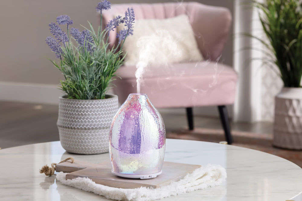 Airome Iridescent Diffuser demonstrates intermittent and continual mist modes for customizable aroma release.