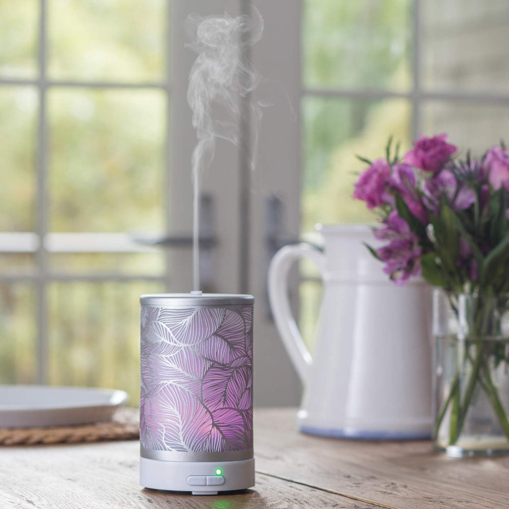 Airome Silverleaf diffuser showcasing eight-color LED lights for mood-enhancing illumination