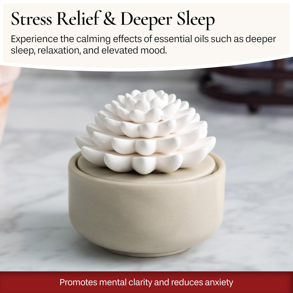 Diffuser on a nightstand in a cozy bedroom