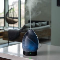 Diffuser displaying 8 LED color options for ambient lighting