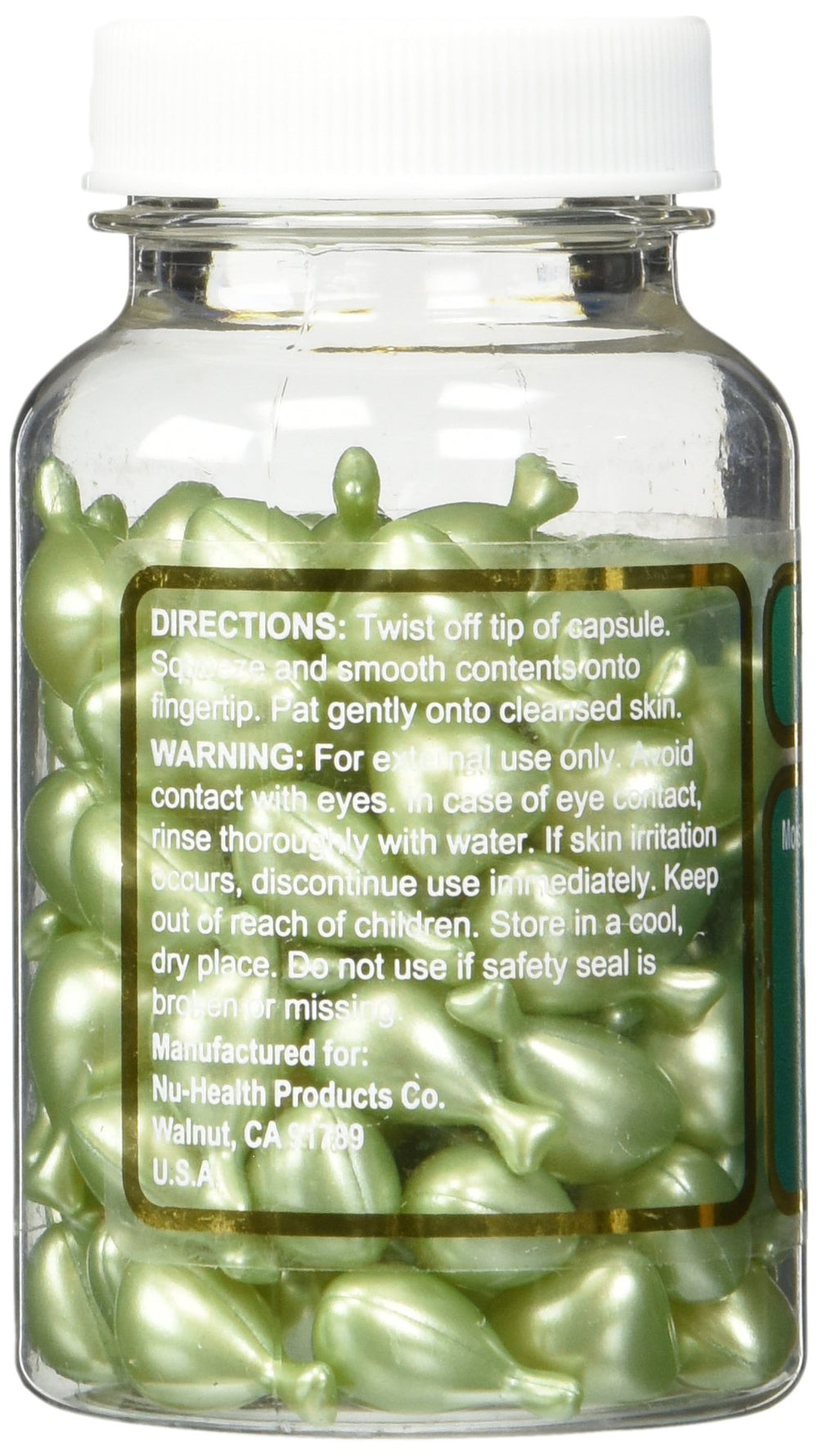 Close-up of 90 green capsules for Aloe Vera & Vitamin E Skin Oil