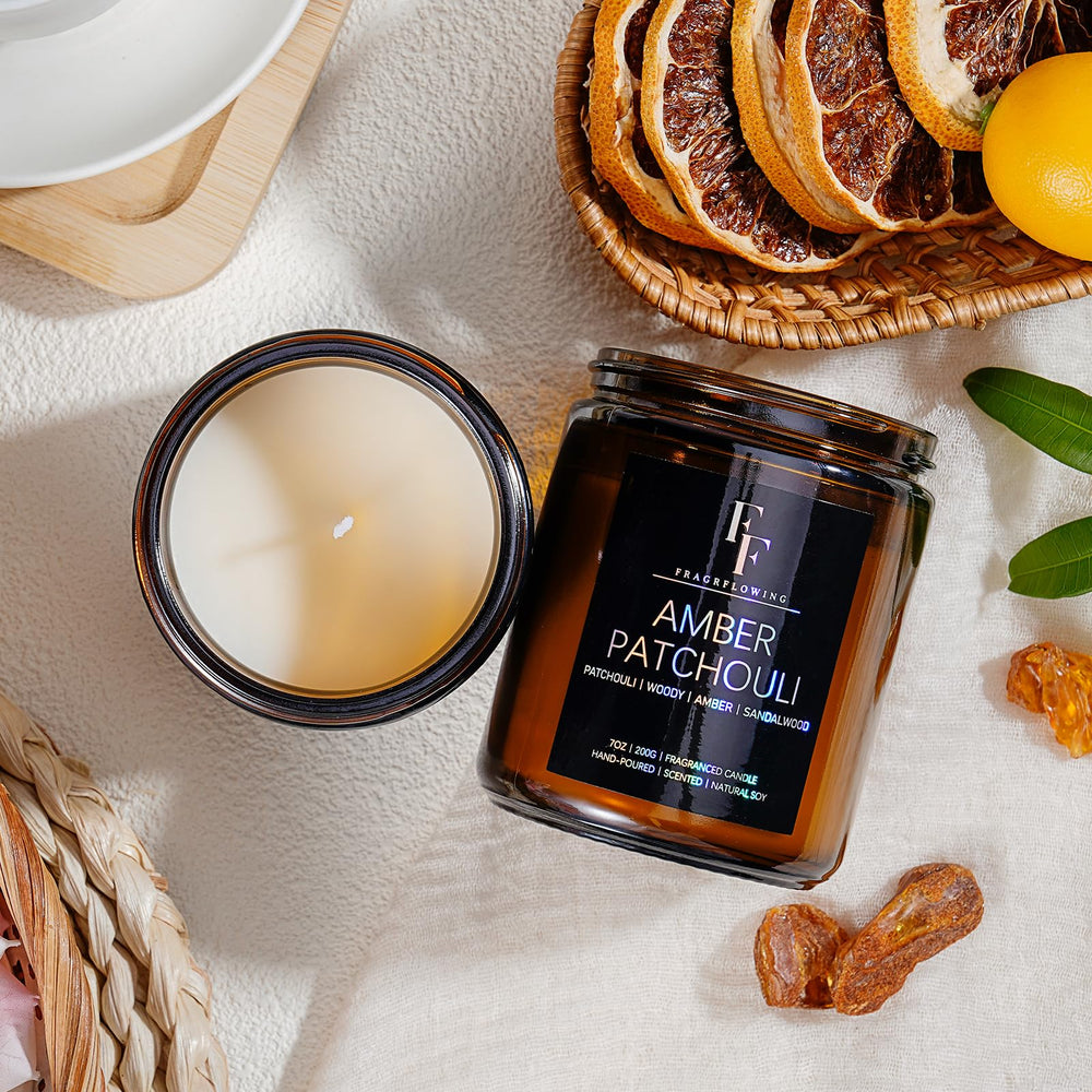 Warm candle glow illuminating a cozy room with amber jar candle
