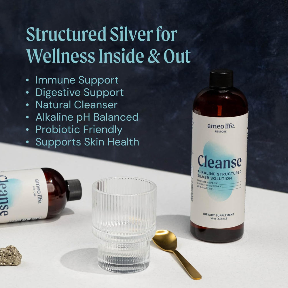 Pouring Ameo Life Colloidal Silver Liquid into a glass
