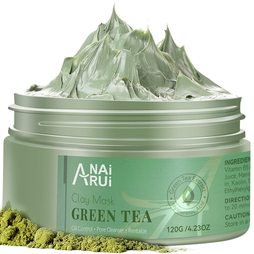 Vanity setup includes ANAI RUI Green Tea Mask beside towels and a plant