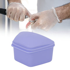 ANGGREK portable denture case carried in hand