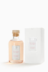 Glass bottle diffuser with reeds for Antica Farmacista Pink Peony & Citron