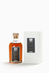 Close-up of sandalwood amber fragrance notes in diffuser
