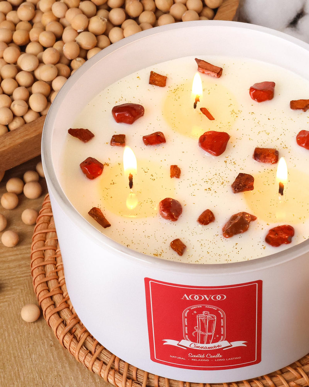 Red Jasper crystal visible inside the candle