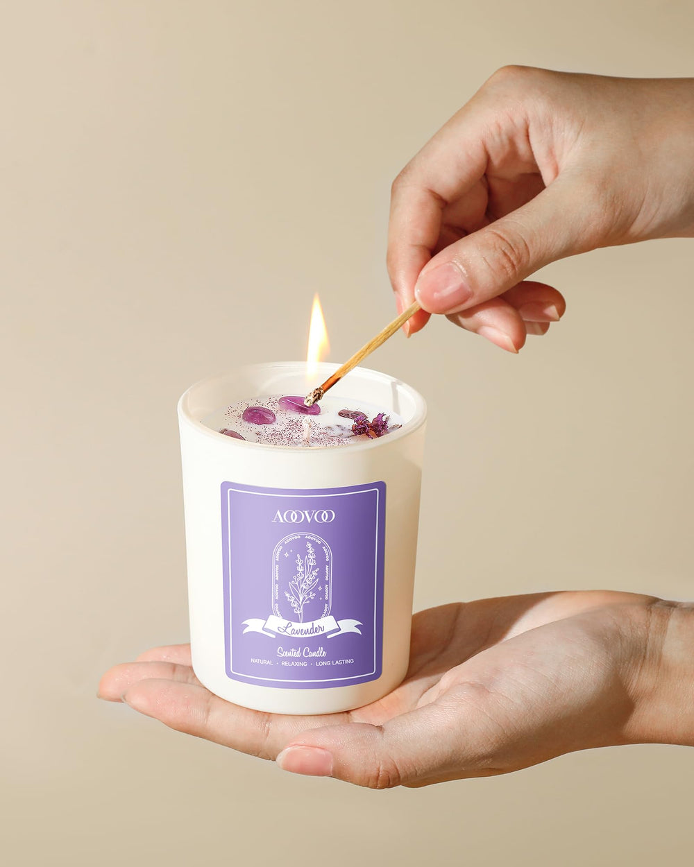 Candle with dried flowers and natural energy crystals