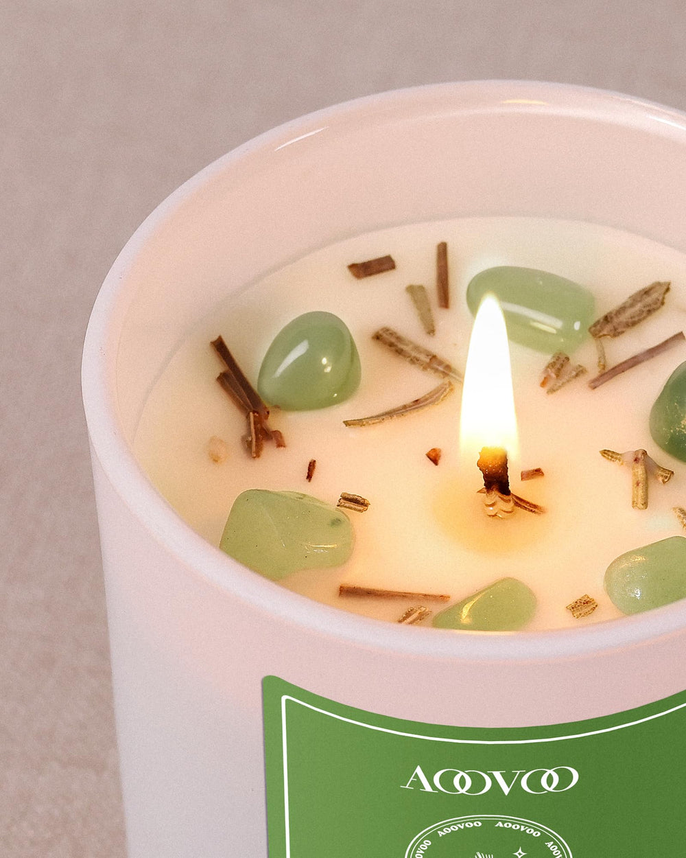 Candle with pine needles and dry flowers for Christmas decor
