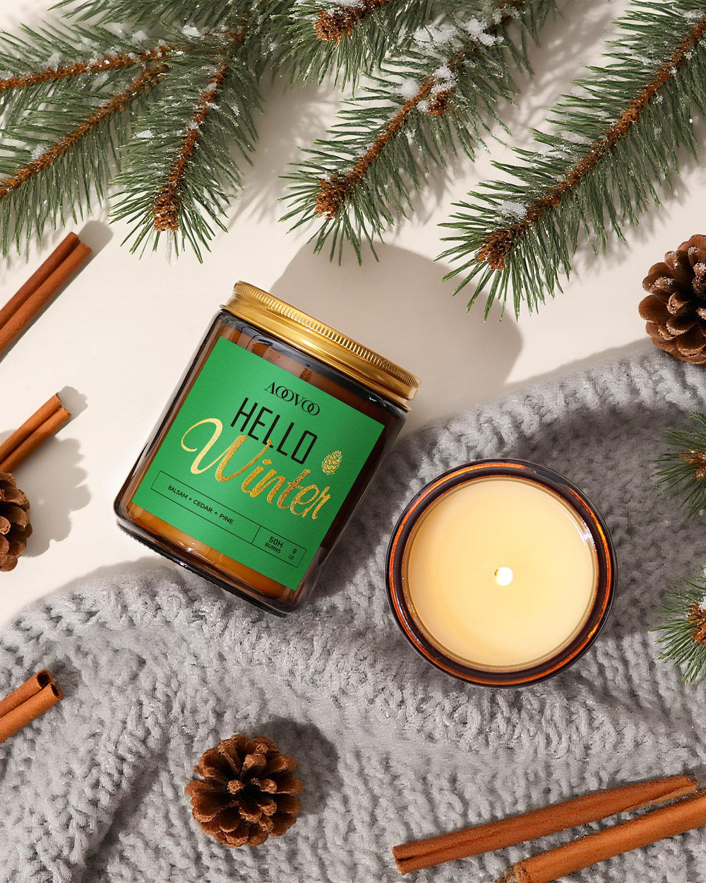 Close-up of pine-scented candle in Glass jar with pine needles