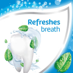 Minty foam on a toothbrush with Aquafresh branding