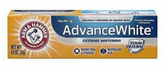 Toothpaste with toothbrush showing whitening focus
