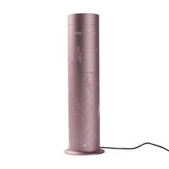 Compact aluminum scent diffuser in modern home setting