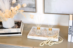 Aroma360 Escapade Paris Diffuser sticks swirl showcases jasmine notes.