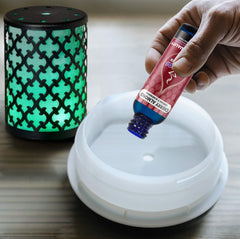 Lifestyle shot of Cherry Almond5 fragrance oil diffusing in a living space