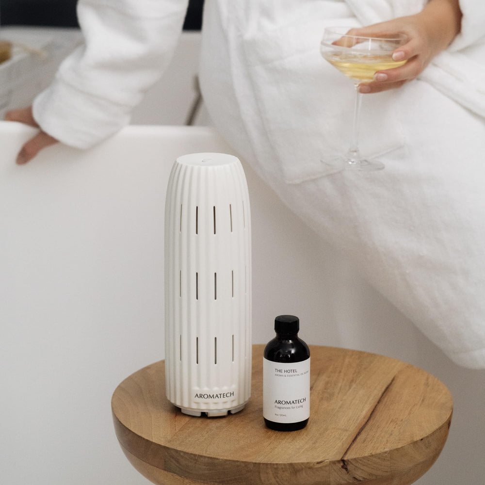 Close-up of Hotel II fragrance diffuser oil bottle and label