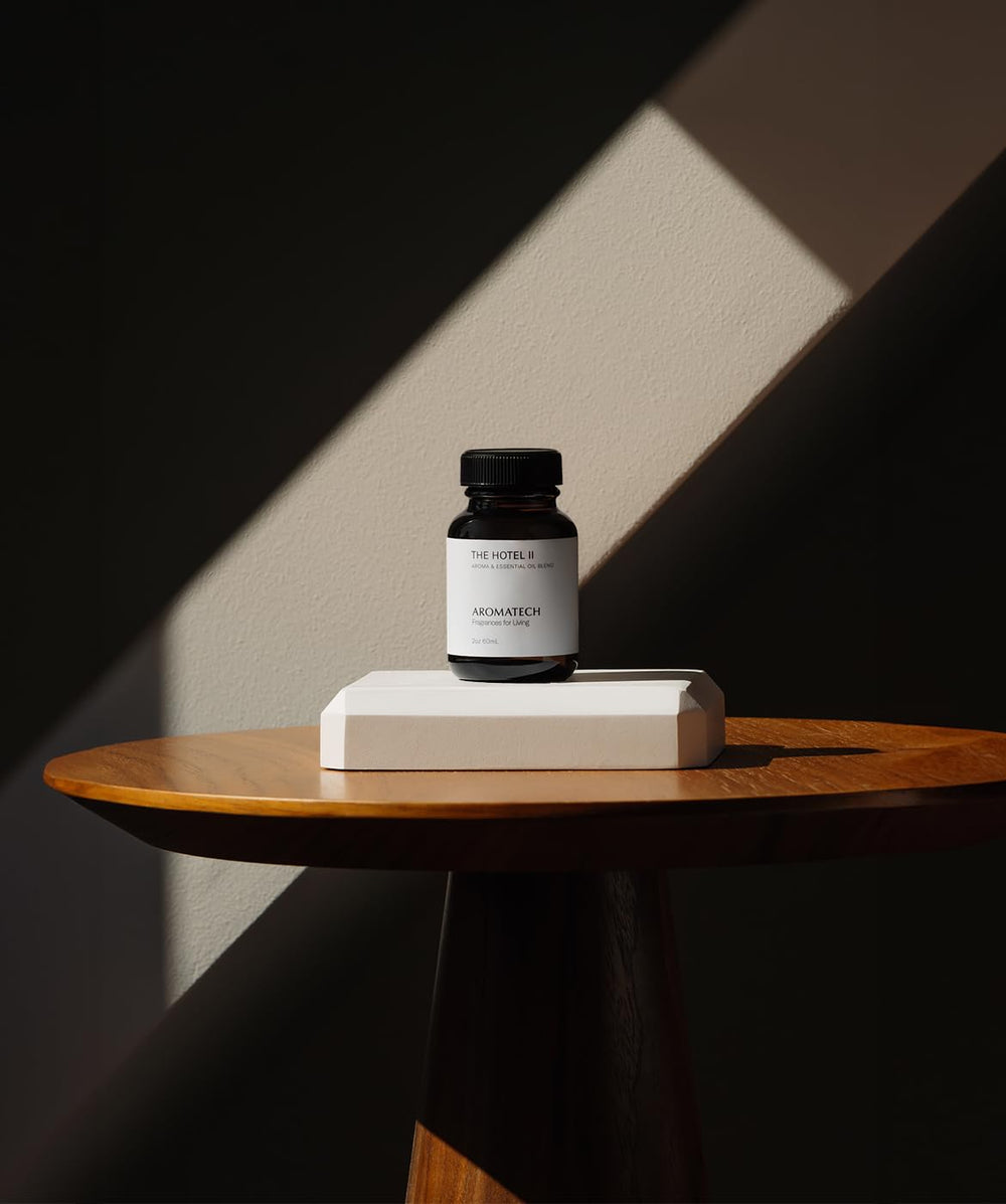 Warm ambient scene of diffuser releasing Hotel II scent