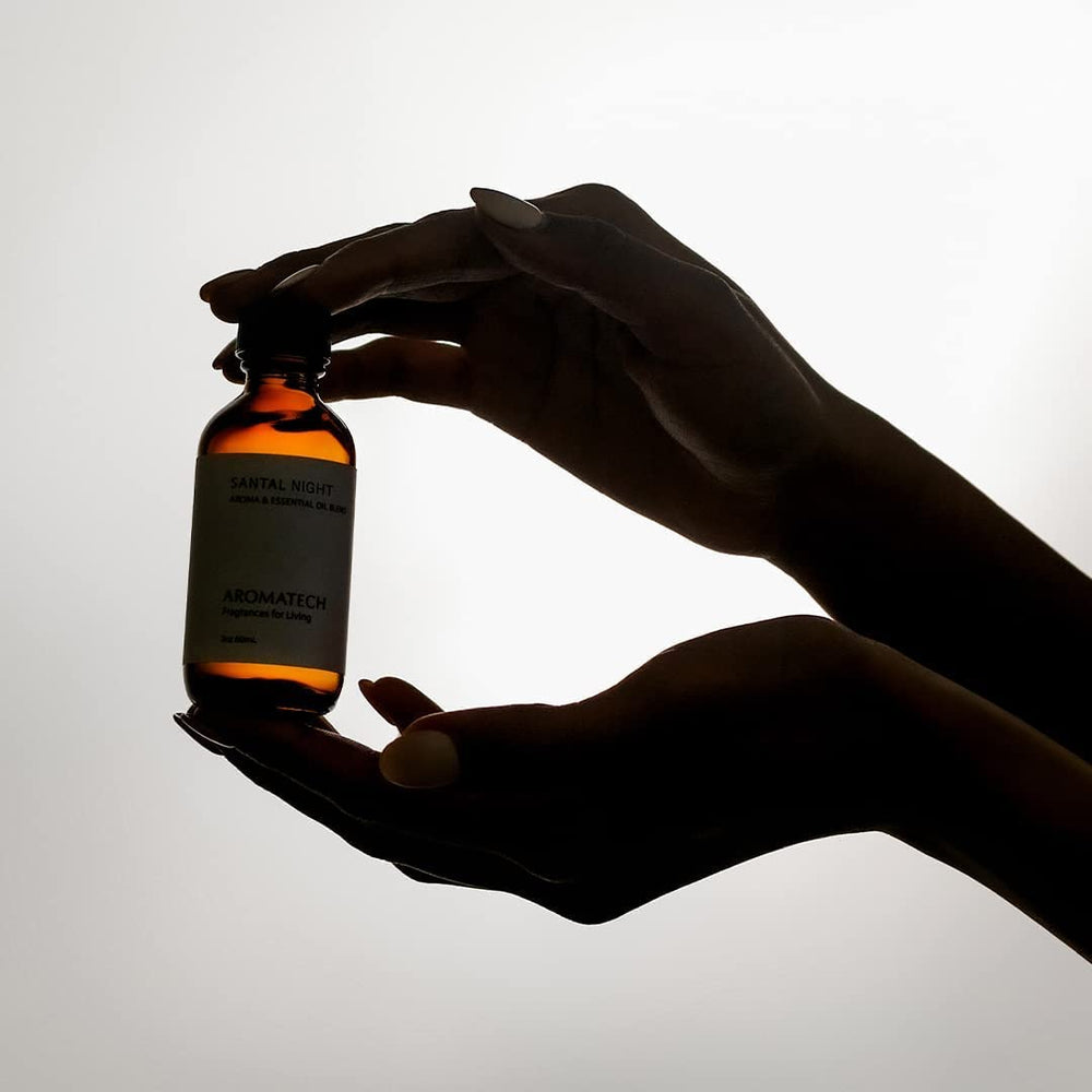 Close-up of Santal Night diffuser oil bottle with label