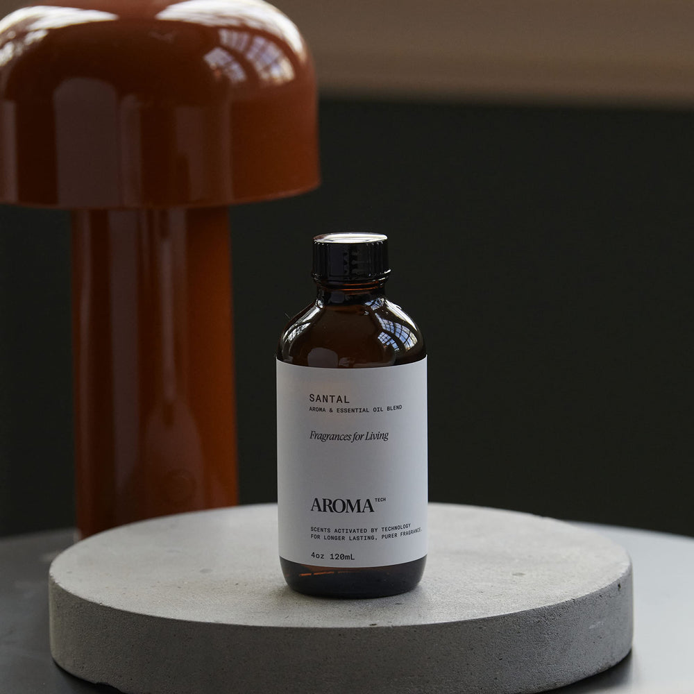 AromaTech diffuser oils shown with compatible diffusers