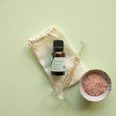 Aromatics International Marjoram Sweet Essential Oil used in a soothing bath blend.