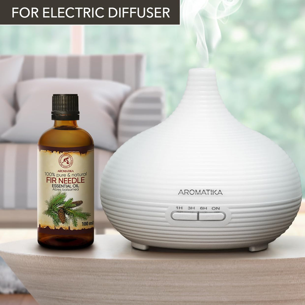 AROMATIKA Fir Needle Essential Oil forest-scene captures cozy, nature-inspired ambience.
