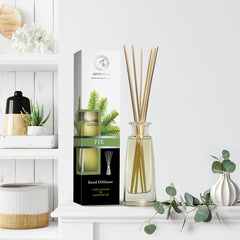 AROMATIKA Pine Reed Diffuser label highlights botanicals and usage tips.