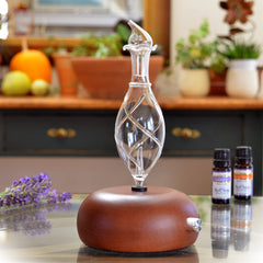 ArOmis Premium Glass Diffuser front view with hand-blown glass reservoir