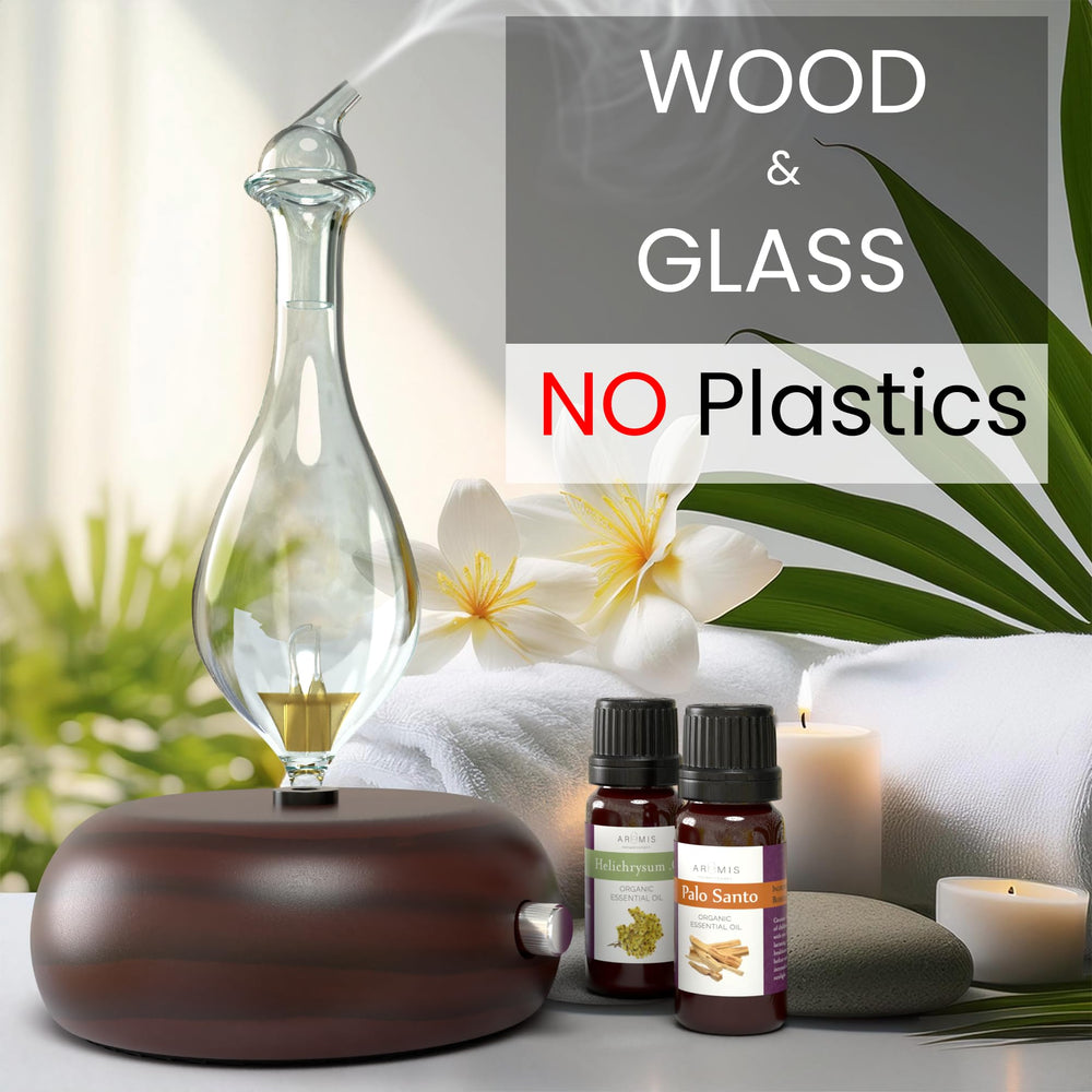 Hand-blown borosilicate glass reservoir close-up with wooden base