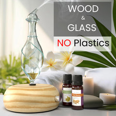 Hand-blown borosilicate glass diffuser with wooden base