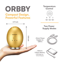 Artronic Orbby gold portable diffuser shown in a car holder for travel aroma.