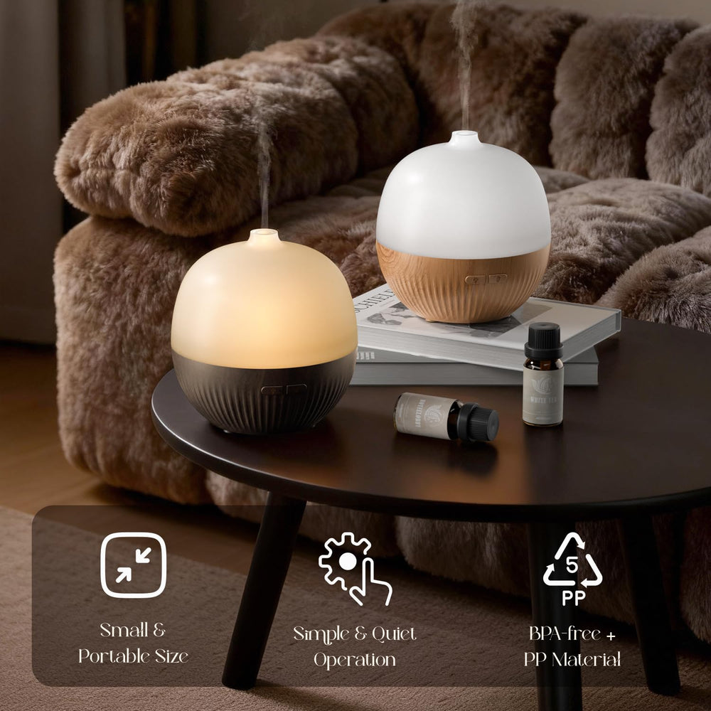 Mist emitting from ARVIDSSON 100ml diffuser in dark wood
