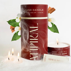 Atipikal Sand Candle 18oz with Saldalwood Jasmine scent floating on water