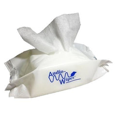 Hearing aids being cleaned with Audiowipes towelettes