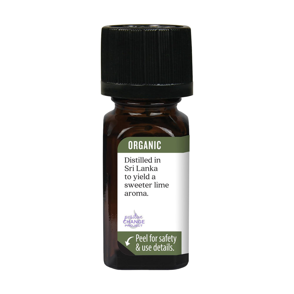 Aura Cacia lime essential oil packaging showing label update note