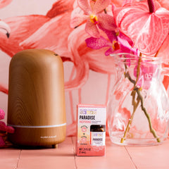 Aura Cacia Paradise essential oil blend used with sea salt for desk air freshener.