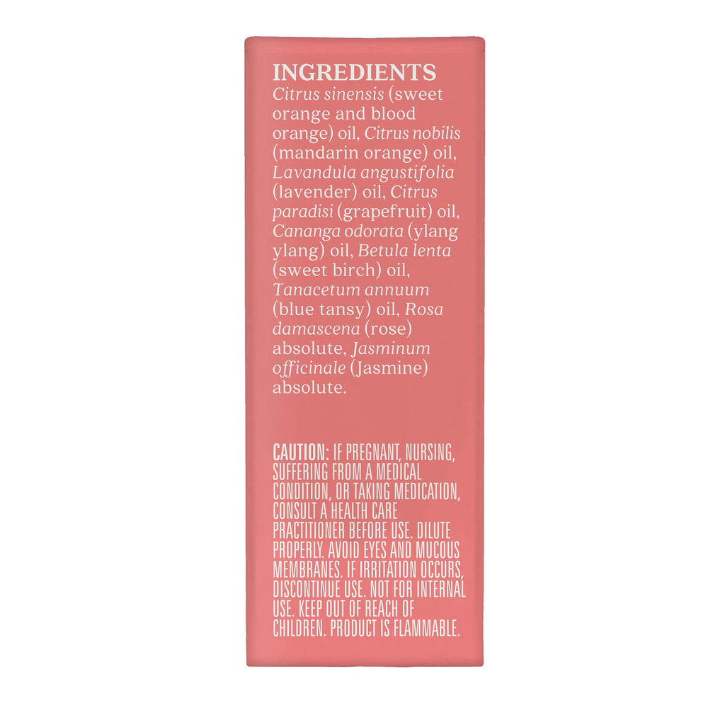 Aura Cacia Paradise essential oil blend label close-up showing natural coloring.