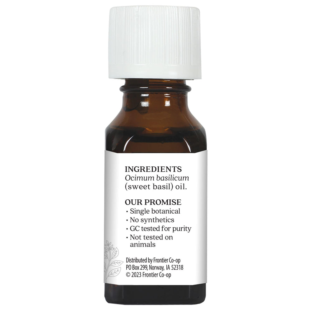 Close-up image of Aura Cacia Sweet Basil Essential Oil label