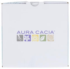 Aura Cacia wood grain diffuser on dresser, soft light for mood rituals